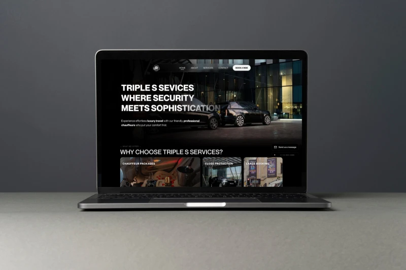 Triple S Services website on the laptop